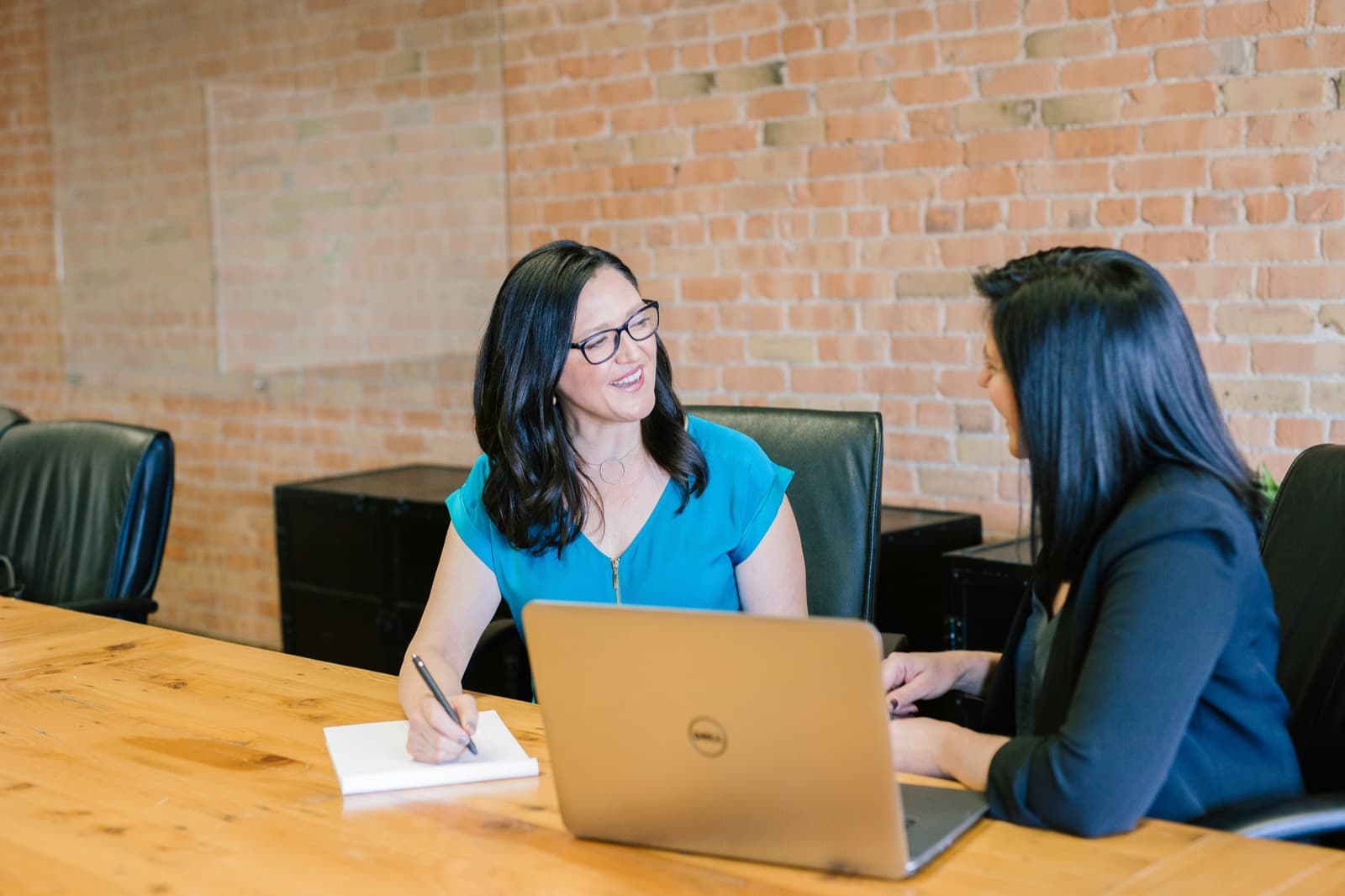 New employee reviewing structured onboarding checklist on laptop during first week at remote agency