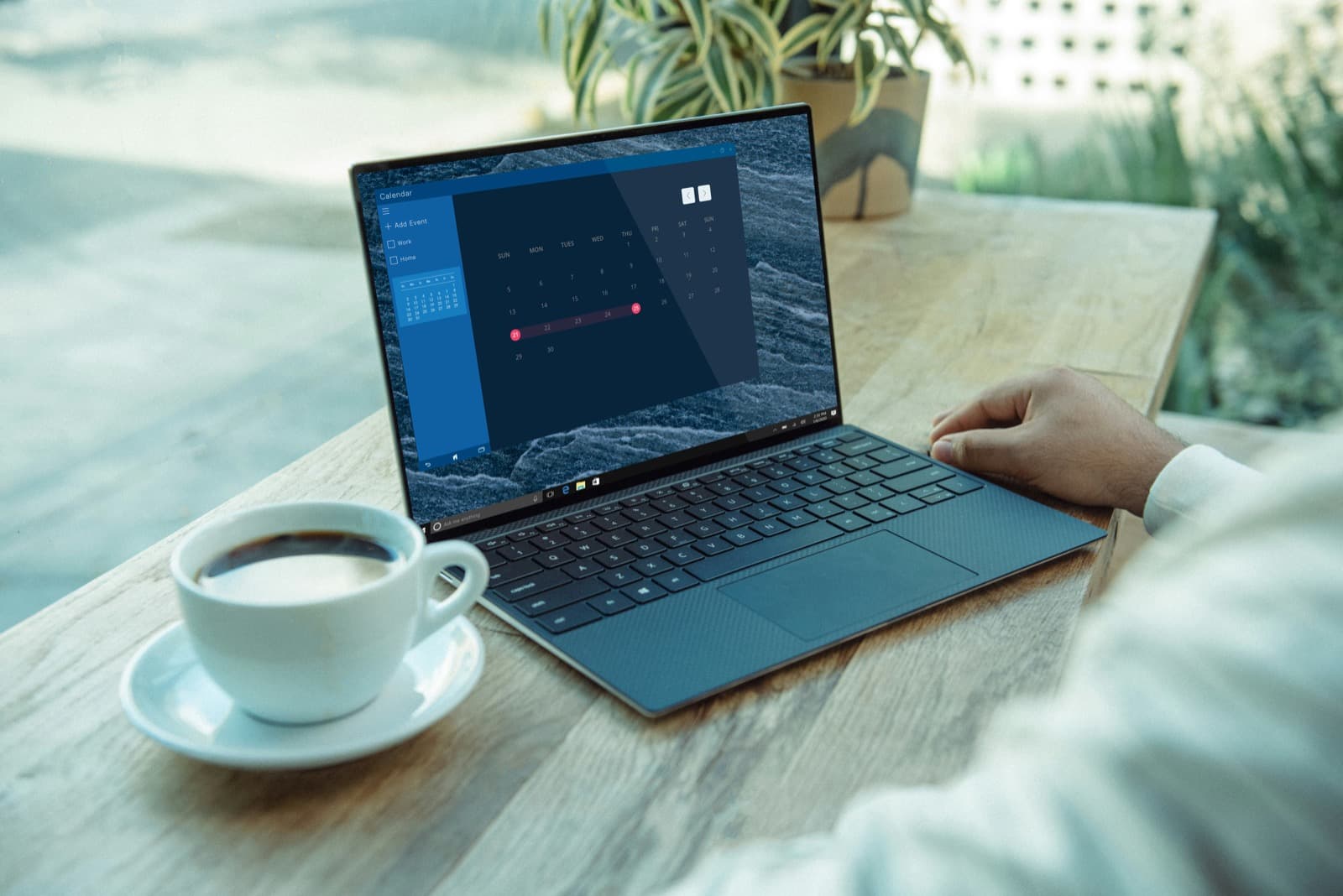 Person working on laptop with productivity metrics and work session data visible on screen