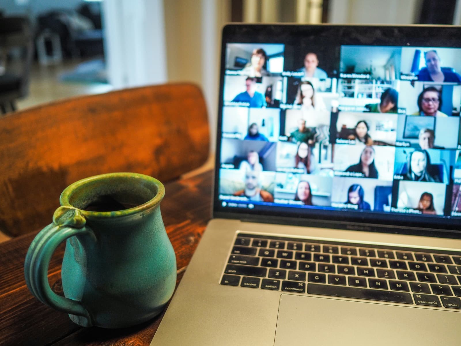 Distributed agency team working remotely with task tracking and team visibility tools on screen